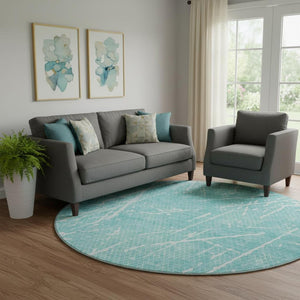 HomeRoots 8' Teal and Ivory Abstract Round Rug - Washable, UV Protected, Perfect for Kids and Pets! 652848