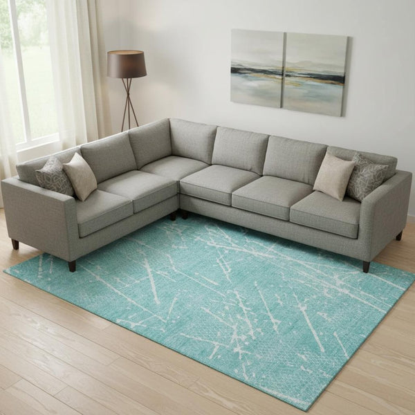 HomeRoots 8' X 10' Teal and Ivory Abstract Area Rug - Washable, UV-Protected & Perfect for Busy Homes! 652849