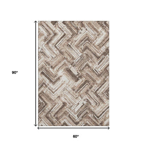 HomeRoots 5' X 8' Brown And Ivory Chevron Area Rug - Washable, Stain-Resistant, UV Protected for Everyday Living 652877