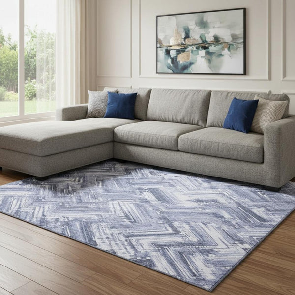 HomeRoots 10' Blue and Ivory Chevron Area Rug – Washable, UV Protected, Stain Resistant for High-Traffic Spaces 652887
