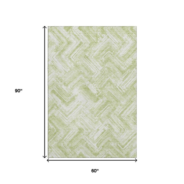 HomeRoots 5' X 8' Green and Ivory Chevron Area Rug – Stylish, Washable, UV Protected for High-Traffic Spaces 652889
