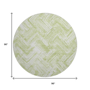 HomeRoots 8' Green and Ivory Chevron Round Rug - Washable, UV Protected, Durable Design for Modern Living Spaces 652890