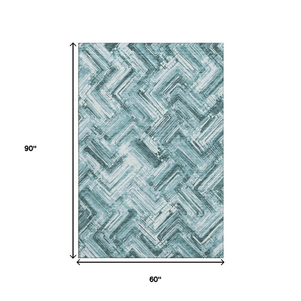 HomeRoots 5' X 8' Teal and Ivory Chevron Area Rug - Washable, UV Protected, Perfect for Homes with Kids & Pets 652901