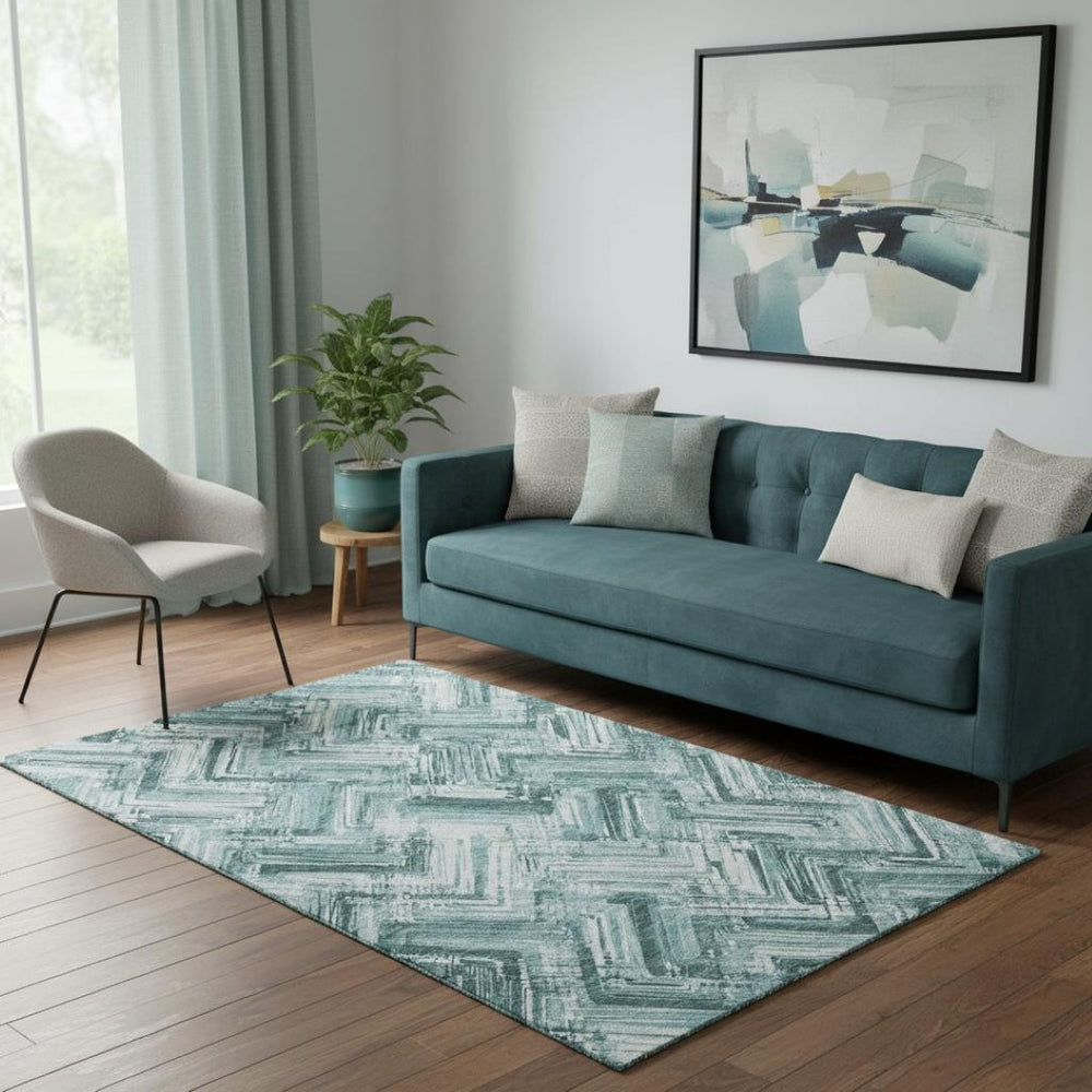 HomeRoots 5' X 8' Teal and Ivory Chevron Area Rug - Washable, UV Protected, Perfect for Homes with Kids & Pets 652901