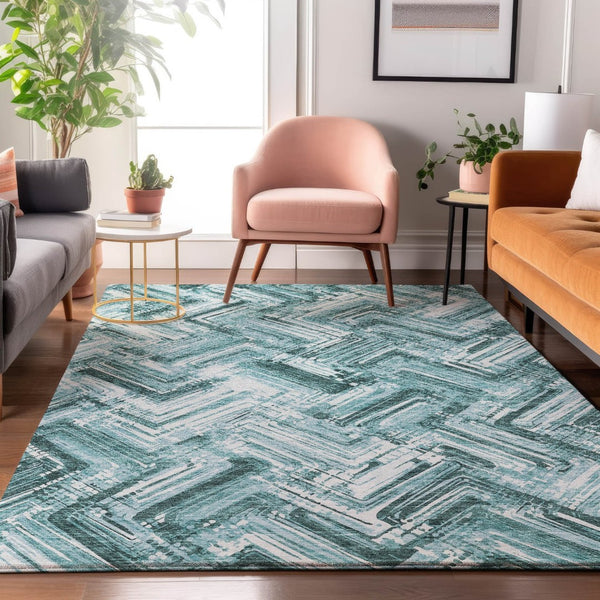 HomeRoots 5' X 8' Teal and Ivory Chevron Area Rug - Washable, UV Protected, Perfect for Homes with Kids & Pets 652901