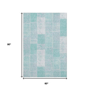 HomeRoots 5' X 8' Aqua and Ivory Patchwork Area Rug – Durable, Washable, and UV-Protected for Any Space! 652913