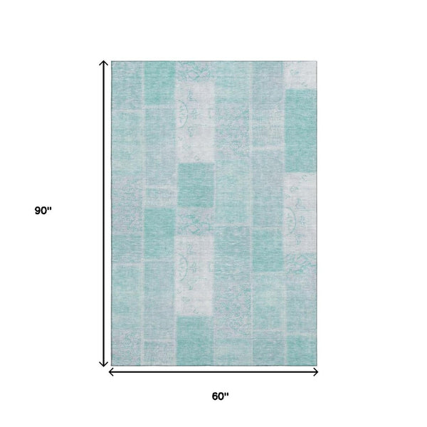 HomeRoots 5' X 8' Aqua and Ivory Patchwork Area Rug – Durable, Washable, and UV-Protected for Any Space! 652913