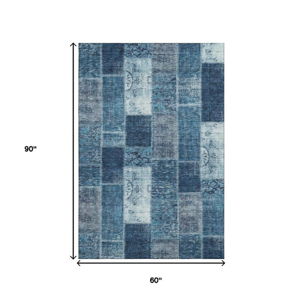 HomeRoots 5' Blue and Ivory Patchwork Area Rug - Washable, UV-Protected, Stain-Resistant with Non-Slip Backing 652931