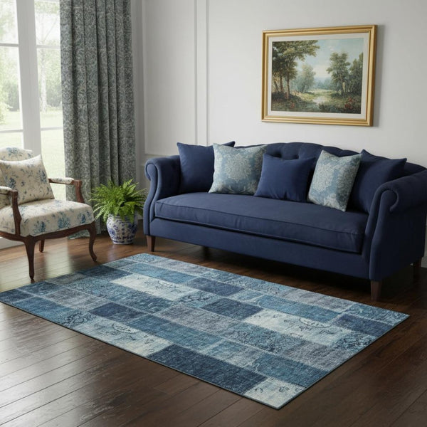 HomeRoots 5' Blue and Ivory Patchwork Area Rug - Washable, UV-Protected, Stain-Resistant with Non-Slip Backing 652931