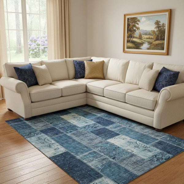 HomeRoots 8' X 10' Washable Blue and Ivory Patchwork Area Rug with UV Protection for Stylish, Durable Living Spaces 652933