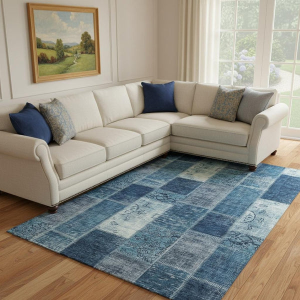 HomeRoots 9' X 12' Blue and Ivory Patchwork Area Rug - Washable, UV-Protected, Durable for Everyday Living 652934