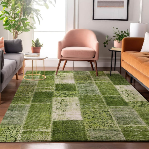 HomeRoots 5' X 8' Olive Green & Ivory Patchwork Rug - Durable, Washable, UV-Protected for High-Traffic Spaces 652937