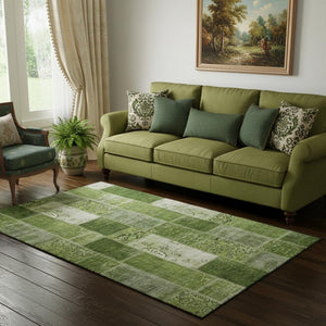 HomeRoots 5' X 8' Olive Green & Ivory Patchwork Rug - Durable, Washable, UV-Protected for High-Traffic Spaces 652937