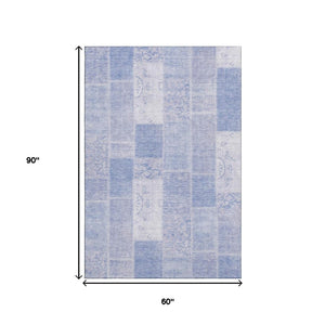 HomeRoots 5' X 8' Sky Blue and Ivory Patchwork Area Rug - Washable, UV-Protected, Stain-Resistant Design! 652955