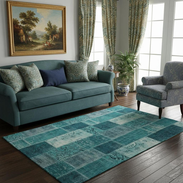 HomeRoots 5' X 8' Teal and Ivory Patchwork Washable Area Rug - Stain Resistant, UV Protected, Stylish Comfort 652967