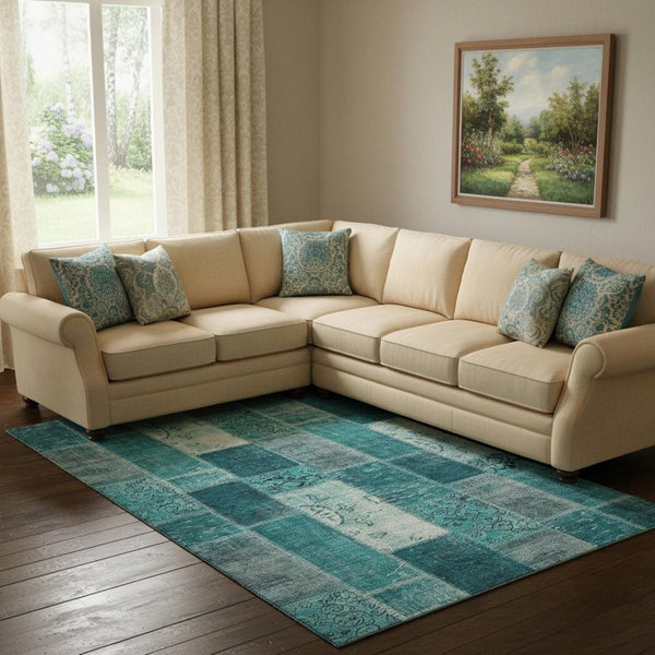 HomeRoots 9' X 12' Teal and Ivory Patchwork Area Rug – Durable, Washable, UV Protected for High-Traffic Spaces 652970