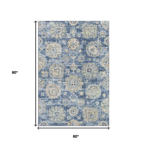 HomeRoots 5' Blue Ivory and Gold Floral Area Rug - Washable, UV Protected, Durable for Busy Homes & Stylish Décor 653184