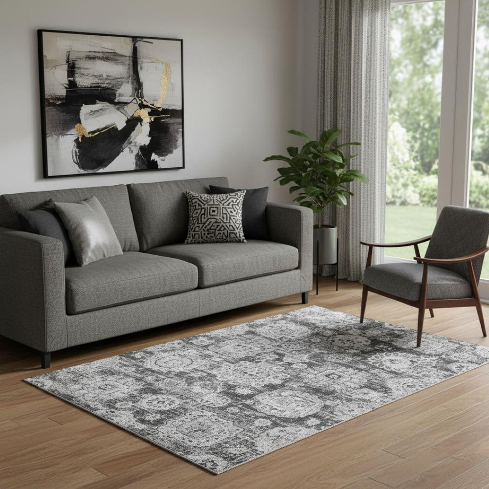 HomeRoots 5' X 8' Gray and Ivory Floral Area Rug - Washable, Stain-Resistant, UV Protected for High-Traffic Spaces 653202