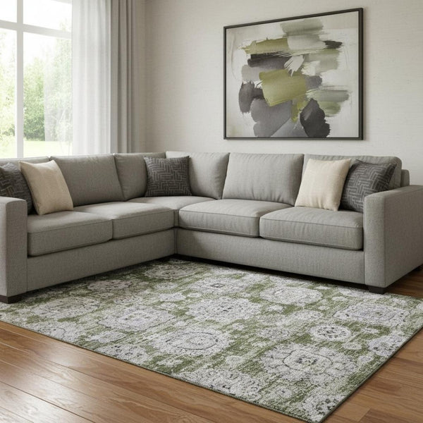 HomeRoots 9' X 12' Washable Floral Area Rug in Olive Green, Purple & Ivory - UV Protected for High-Traffic Spaces 653223