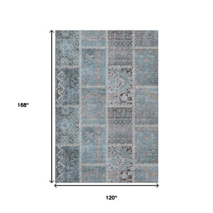 HomeRoots 10' Teal and Beige Patchwork Area Rug - Washable, UV-Protected, Durable for High-Traffic Spaces 653260