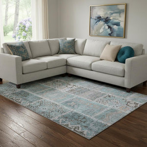 HomeRoots 10' Teal and Beige Patchwork Area Rug - Washable, UV-Protected, Durable for High-Traffic Spaces 653260