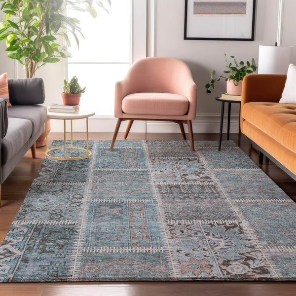 HomeRoots 10' Teal and Beige Patchwork Area Rug - Washable, UV-Protected, Durable for High-Traffic Spaces 653260