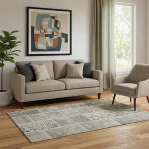 HomeRoots 5' X 8' Washable Taupe and Ivory Patchwork Area Rug with UV Protection and Stain Resistance Features 653262