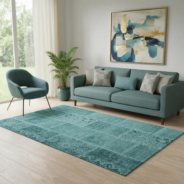 HomeRoots 5' X 8' Vibrant Turquoise & Aqua Patchwork Area Rug - Durable, Washable & UV-Resistant Design 653268