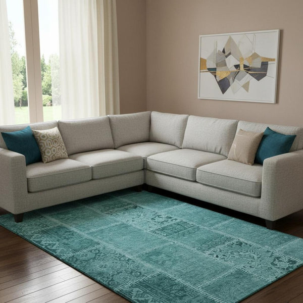 HomeRoots 10' Turquoise & Aqua Patchwork Area Rug - Washable, UV-Protected, Ideal for Family Spaces & Patios 653272