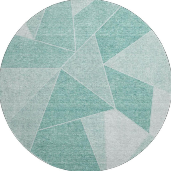HomeRoots 8' Teal And Ivory Geometric Round Rug - Washable, UV-Protected, Soft, and Stylish for Any Space 653335