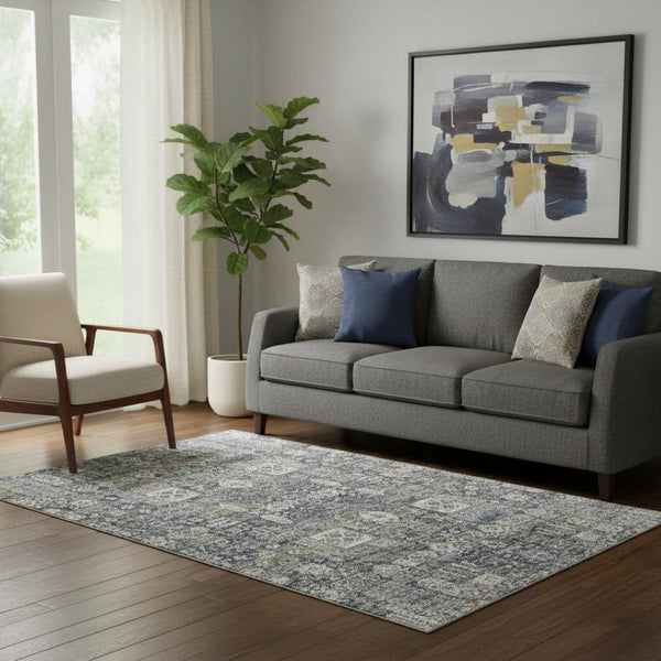 HomeRoots 5' X 8' Charcoal Ivory Gold Floral Area Rug - Washable, UV Protected, Stain Resistant for Homes 653364