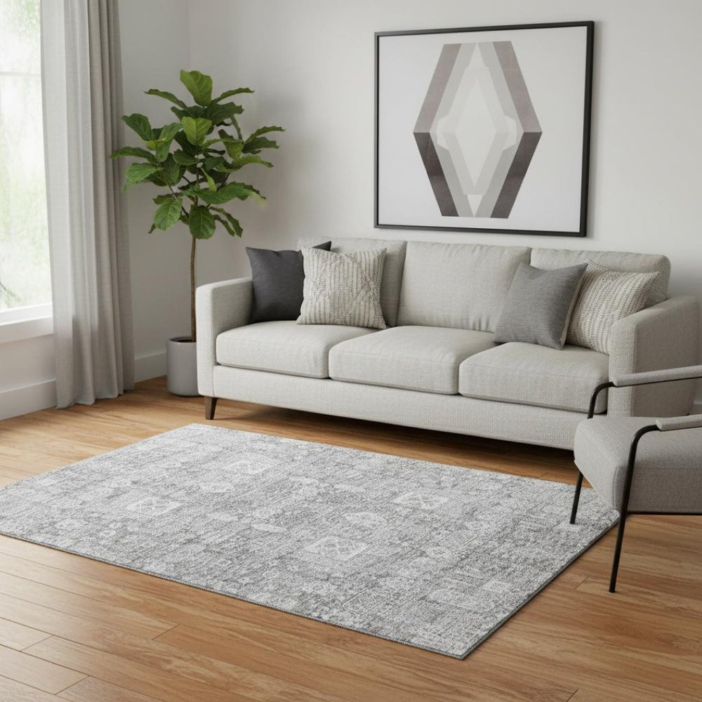 HomeRoots 5' X 8' Gray And Ivory Floral Washable Area Rug - Stylish, Durable, UV Protected for Family Spaces 653388