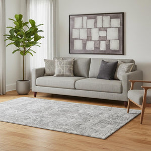 HomeRoots 5' X 8' Gray And Ivory Floral Washable Area Rug - Stylish, Durable, UV Protected for Family Spaces 653388