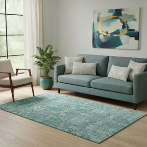 HomeRoots 5' X 8' Vibrant Teal & Aqua Floral Washable Area Rug – Durable, Stain-Resistant, UV Protected Design 653418