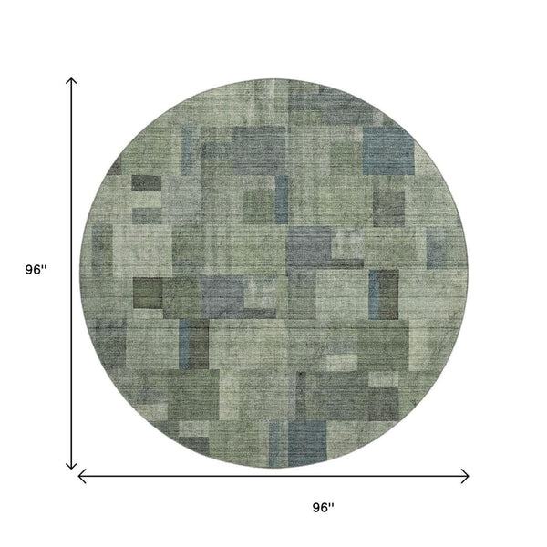 HomeRoots 8' Modern Geometric Round Rug in Green, Blue, and Gray – Washable, UV-Protected, Stain Resistant! 653431