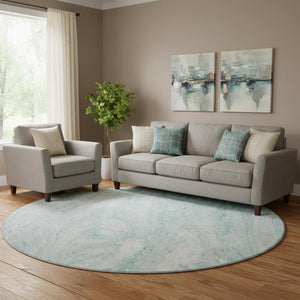 HomeRoots 8' Teal And Ivory Abstract Round Rug - Washable, UV-Protected, Durable for High-Traffic Areas! 653467