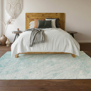 HomeRoots 9' X 12' Teal and Ivory Abstract Area Rug - Washable, UV-Protected, Durable Design for Families 653469