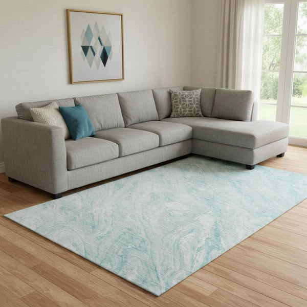 HomeRoots 9' X 12' Teal and Ivory Abstract Area Rug - Washable, UV-Protected, Durable Design for Families 653469