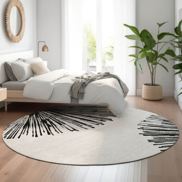 HomeRoots 8' Black And Ivory Abstract Round Rug - Washable, UV Protected, Stain Resistant for Modern Homes 653527