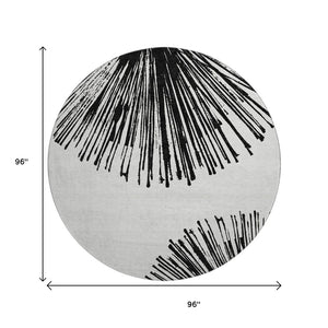 HomeRoots 8' Black And Ivory Abstract Round Rug - Washable, UV Protected, Stain Resistant for Modern Homes 653527