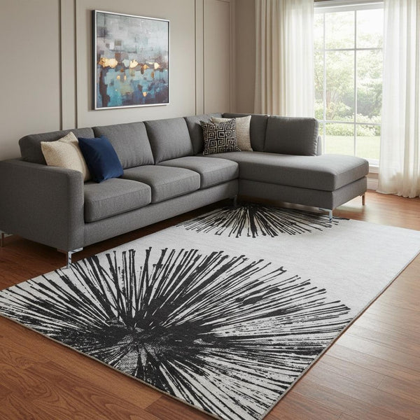 HomeRoots 8' X 10' Abstract Black And Ivory Washable Area Rug - Durable, UV Protected, Perfect for Homes with Kids 653528