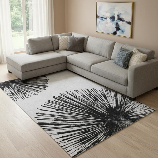 HomeRoots 9' X 12' Black And Ivory Abstract Area Rug – Stylish, Washable, UV-Protected for High-Traffic Spaces 653529