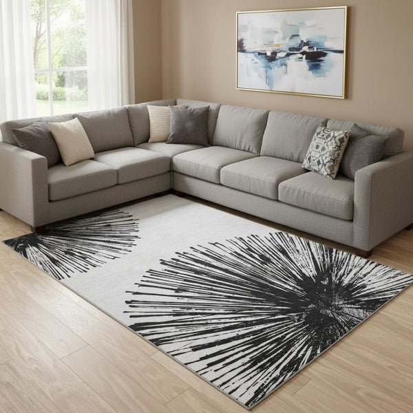 HomeRoots 10' X 14' Black And Ivory Abstract Area Rug - Stylish, Washable, UV-Protected for Busy Homes! 653530