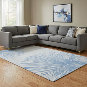 HomeRoots 9' X 12' Denim Blue and Ivory Abstract Area Rug – Washable, UV Protected, Ideal for High-Traffic Spaces 653535