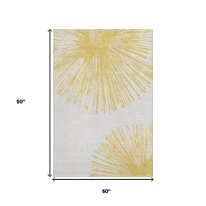 HomeRoots 5' X 8' Gold And Ivory Abstract Washable Area Rug With Stain Resistance & UV Protection For Home 653538
