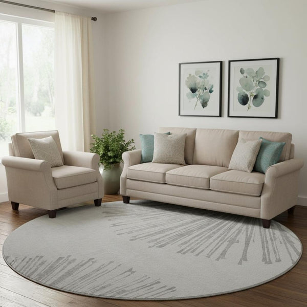 HomeRoots 8' Gray And Ivory Abstract Round Rug - Washable, UV Protected, Durable & Stylish for Any Space 653545