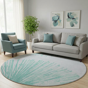 HomeRoots 8' Teal and Ivory Abstract Round Rug - Washable, UV-Protected, Durable Design for High-Traffic Areas 653557