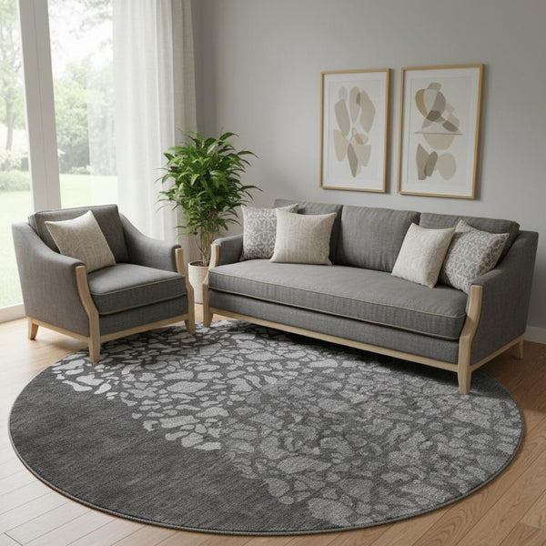 HomeRoots 8' Charcoal and Ivory Abstract Round Rug - Washable, UV Protected, Family-Friendly & Stylish Design 653569
