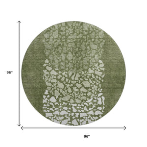 HomeRoots 8' Olive Green and Ivory Abstract Round Rug - Washable, Stain-Resistant, UV-Protected for Modern Spaces 653587