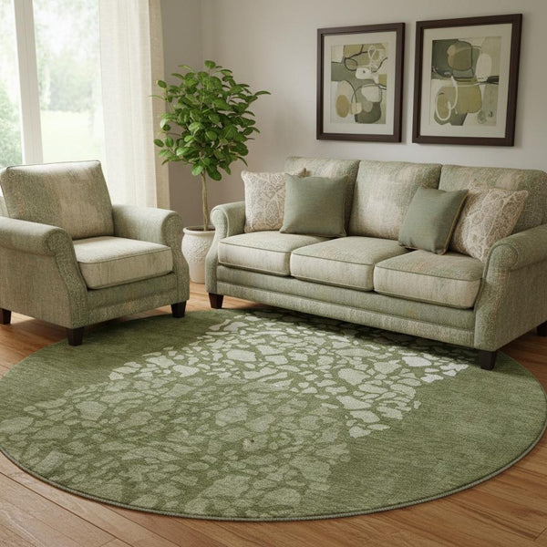 HomeRoots 8' Olive Green and Ivory Abstract Round Rug - Washable, Stain-Resistant, UV-Protected for Modern Spaces 653587